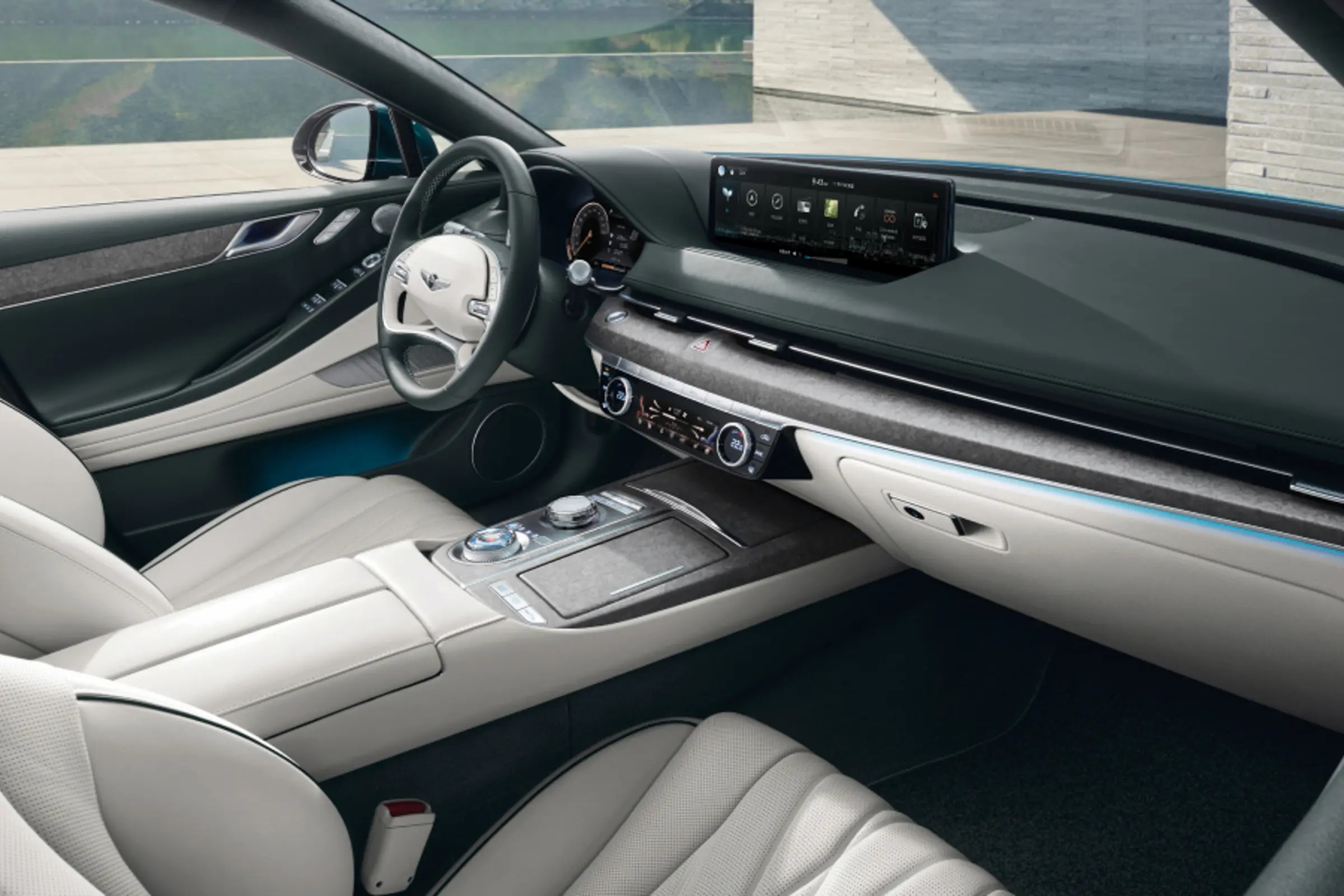 内饰方面,捷尼赛思g80 ev也并没有作出太大幅度的改动,内饰设计同样与